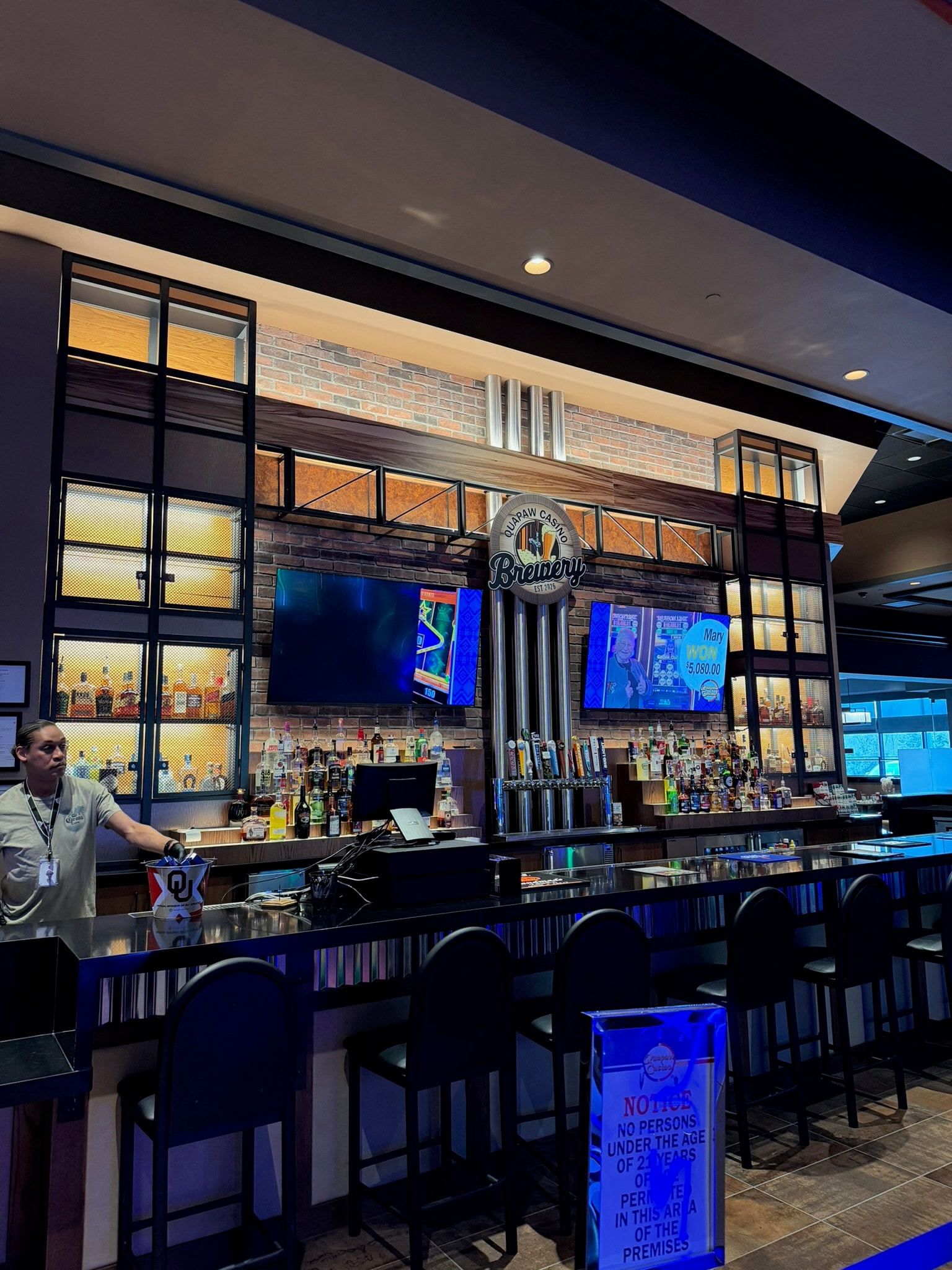 Custom metalwork and architectural steel details at a casino brewery bar