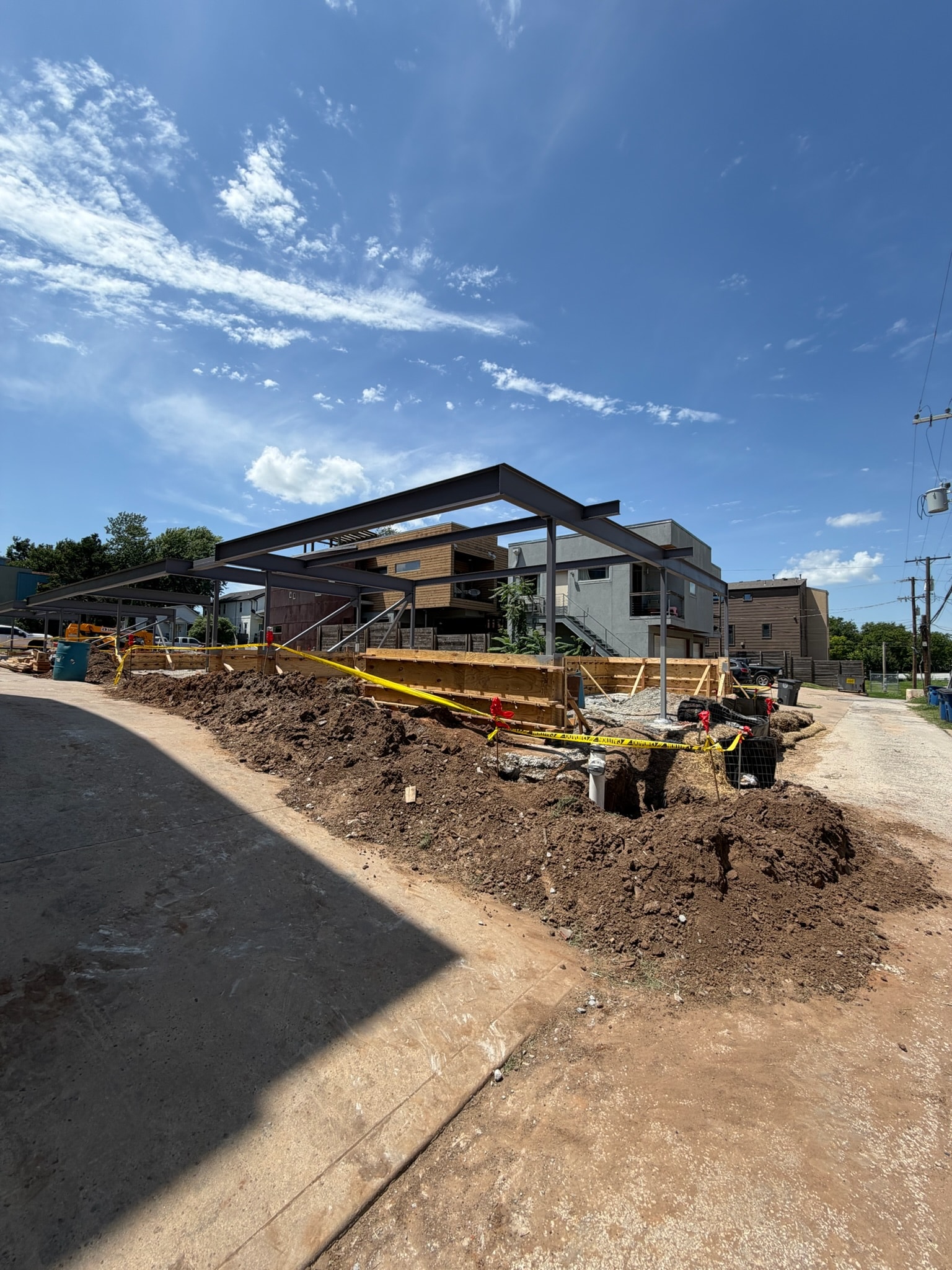 Steel canopy framing installed at a commercial construction site