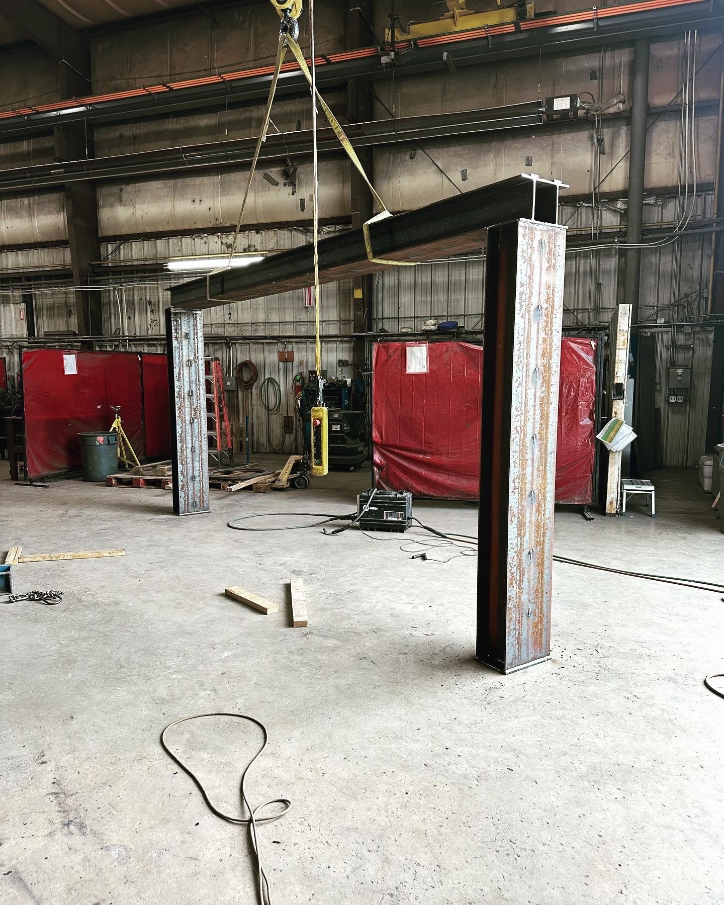 Custom steel frame fabricated and lifted in the Claudio Welding shop