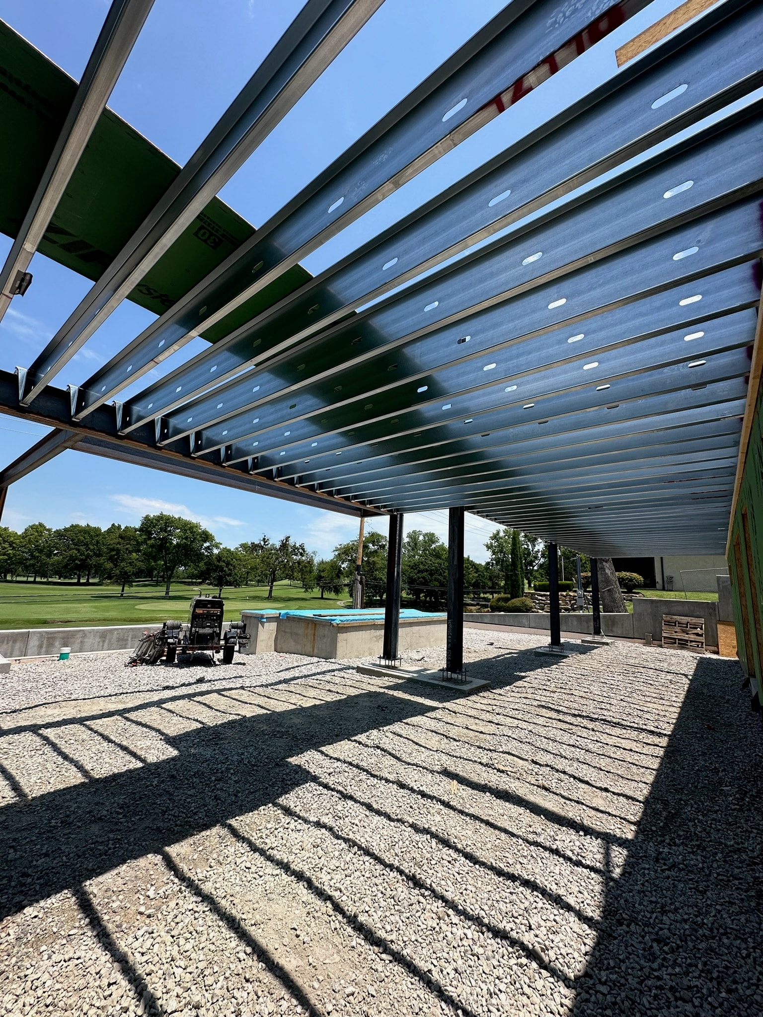 Steel deck joists installed beneath a residential addition